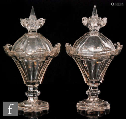 A pair of large 19th Century pedestal bowls and covers,