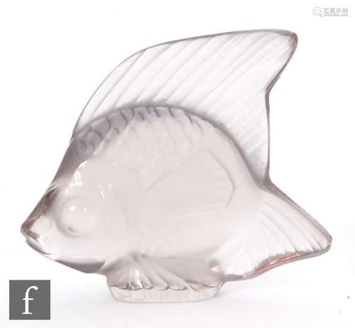 A Lalique glass fish sculpture in lilac, engraved signature, height 4.5cm.