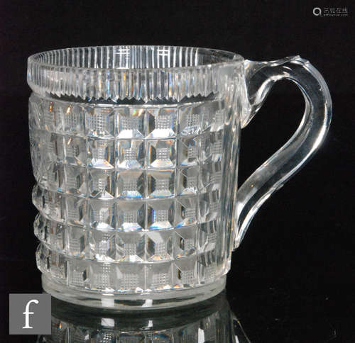 An early 19th Century tankard of cylindrical form with facet cut loop handle,