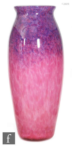 A 1930s Monart glass vase of slender baluster form with an everted rim internally decorated with a