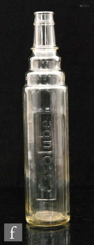 A 20th Century clear glass Esso Super Lube motor oil bottle relief moulded with 'Essolube' logo,