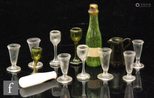 A set of late 19th Century miniature table glass to include wine glasses, jug and bottle,