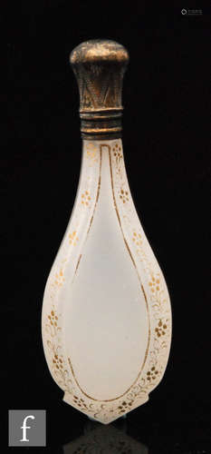 A late 19th Century opaline scent bottle of tear drop form with fine gilded floral decoration