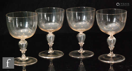 A set of four late 18th to early 19th Century Venetian goblets with a large ovoid bowl above a