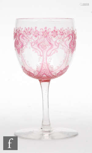 A late 19th Century port glass by St Louis with ovoid bowl, slender stem and circular foot,