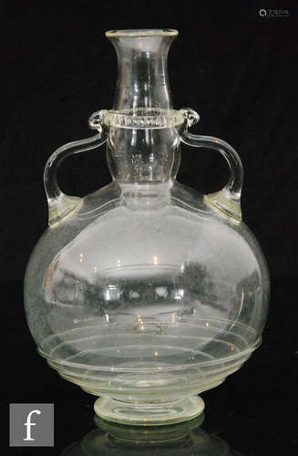 An early 20th Century James Powell & Sons (Whitefriars) Roman inspired decanter in pale green,