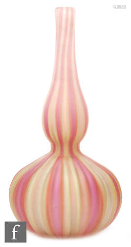 A late 19th Century Stourbridge glass vase of double form with extended neck,