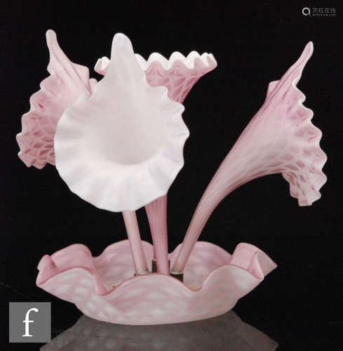 An 19th Century pink satin air trap four flute epergne crimped bowl below conforming flaring