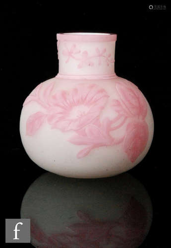 A late 19th Century Thomas Webb & Sons cameo glass vase of globe and shaft form cased in opal and