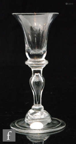 An 18th Century balustroid drinking glass circa 1730,