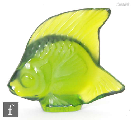 A Lalique glass fish sculpture in green meadow, engraved signature, height 4.5cm.