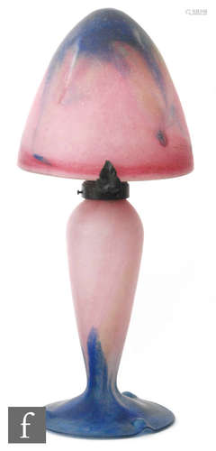 An early 20th Century Le Verre Francais glass table lamp with a domed tonal blue to pink shade with