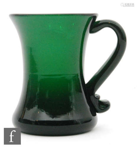 A late 18th Century Bristol green tankard circa 1800 of waisted cylindrical form with an S form