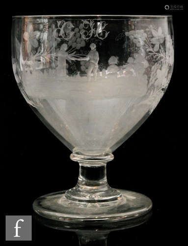 A late 18th to early 19th Century oversized Rummer or marriage goblet with a swollen ovoid bowl