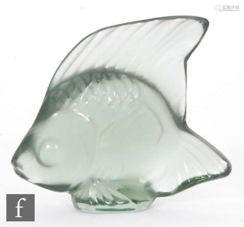 A Lalique glass fish sculpture in mint green, engraved signature, height 4.5cm.