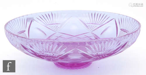 A later 20th Century Webb Corbett dichroic glass bowl of footed shallow form in amethyst with cut