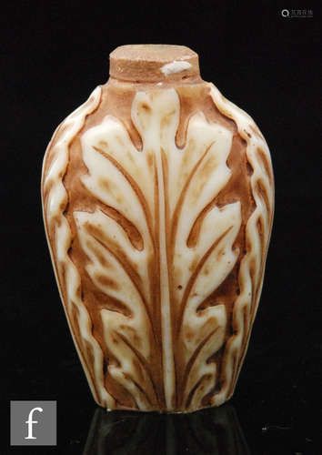 A late 19th Century Thomas Webb & Sons Ivory scent bottle of shouldered form decorated with carved