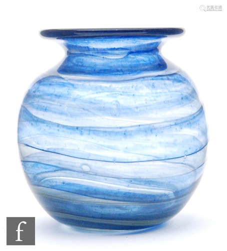 An Isle of Wight glass a rounded globe vase extending to a flared rim, and blue swirl decoration,