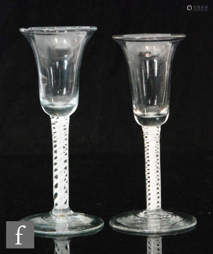 A continental drinking glass in the 18th Century taste with a slender round funnel bowl with