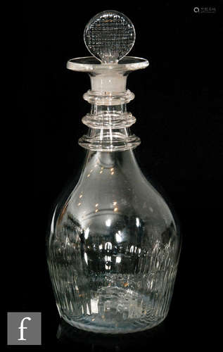 A late 18th Century Irish Co Cork decanter of Prussian form with basal vertical moulded ribbing