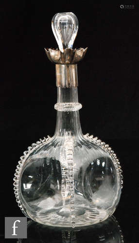 A late 19th Century Stuart & Sons clear crystal decanter of globe and shaft form with dimple