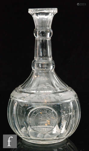 An early 19th Century carafe circa 1820 of globe and shaft form with lower slice cut body decorated