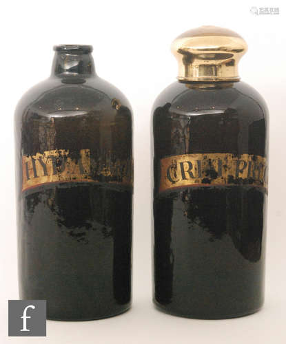 A 19th Century olive green pharmaceutical bottle of cylindrical shouldered form with short collar