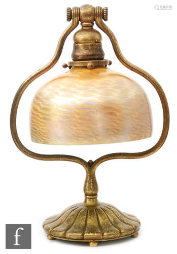 An early 20th Century Tiffany Studios, New York, Bronze D'ore and Favrile glass table lamp,