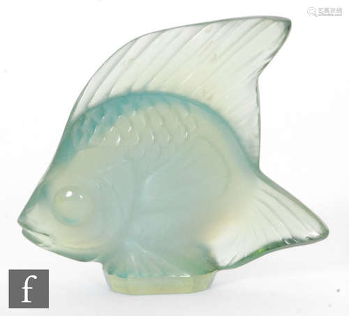 A Lalique glass fish sculpture in opalescent antinea green, engraved signature, height 4.5cm.