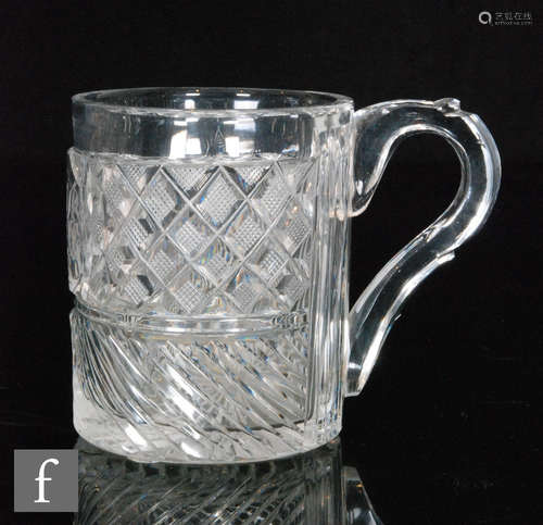 An early 19th Century tankard of cylindrical form with facet cut loop handle,