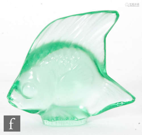 A Lalique glass fish sculpture in lime green, engraved signature, height 4.5cm.