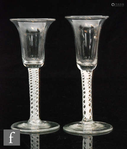 A continental drinking glass in the 18th Century taste with a slender round funnel bowl with