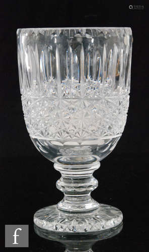 A later 20th Century clear cut crystal glass vase by Reg Everton of Bridge Crystal with repeat