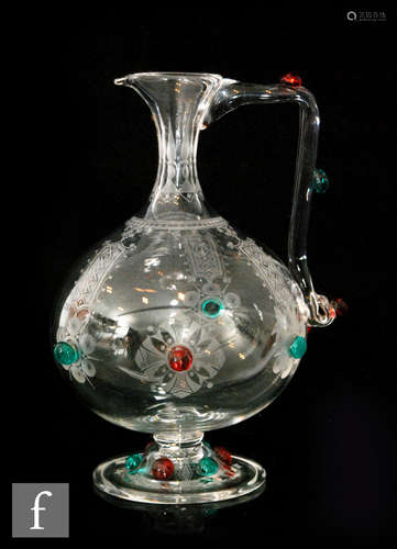 A mid 19th Century Stourbridge crystal glass jug in the manner of Dr Christopher Dresser of footed