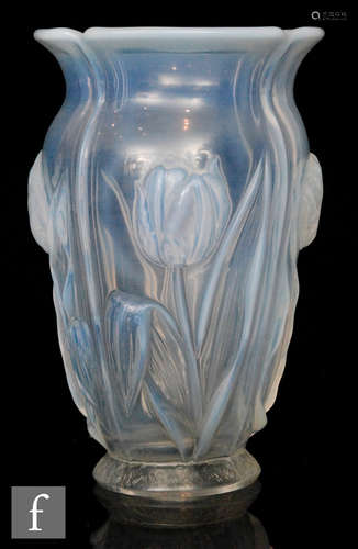 A 1930s Barolac vase of footed ovoid form with panels moulded in relief with poppies,