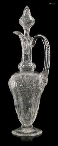 A large early 20th Century Stevens and Williams clear crystal claret jug by Joshua Hodgetts,