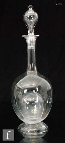 A late 19th Century Stourbridge crystal glass ice decanter with internal ice aperture to the body