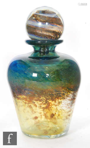 An Isle of Wight glass azurene glass vase with stopper, of baluster form with swirling green,