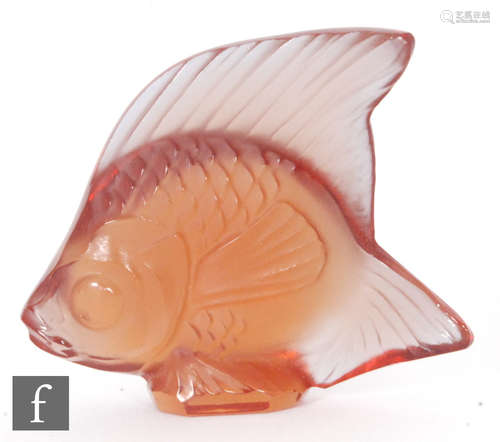 A Lalique glass fish sculpture in a shade of frosted amber, engraved signature, height 4.5cm.