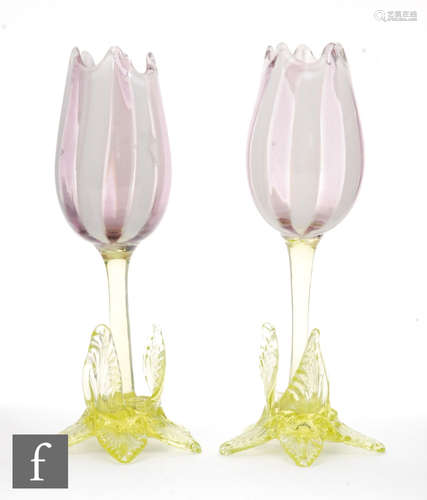 A pair of late 19th Century Stourbridge Tulip vases with white and amethyst glass bowls above a