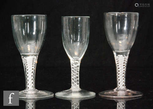 A continental drinking glass in the 18th Century taste with an ovoid bowl with everted rim above a