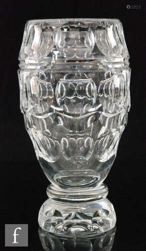 A 1930s Thomas Webb & sons clear crystal glass vase of footed ovoid form decorated with oval