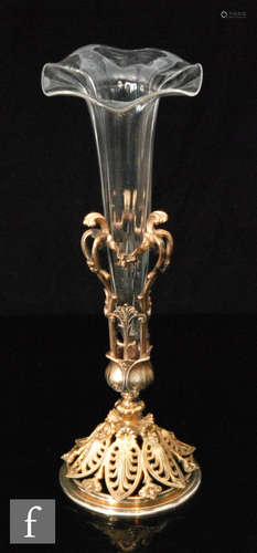 A late 19th Century Stourbridge clear crystal epergne trumpet of fluted form with a wave edge rim,