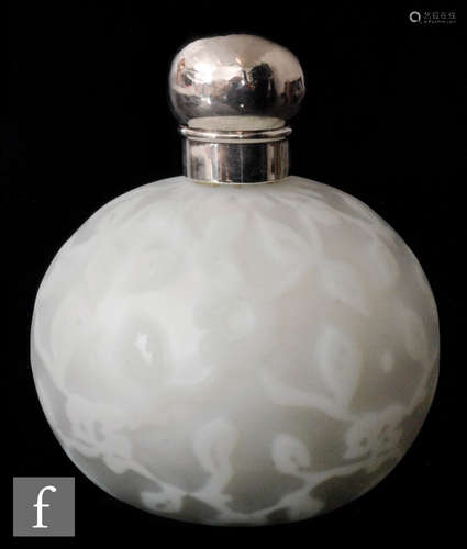 A 19th Century satin air trap scent bottle by Harrach of spherical form cased in clear crystal over