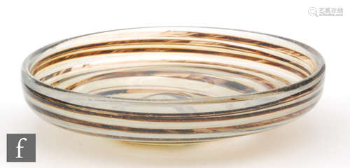 An Isle of Wight glass tortoishell bowl, by Michael Harris, the shallow bowl,