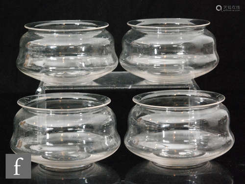 A set of four late 19th Century James Powell & Sons (Whitefriars) clear crystal finger bowls