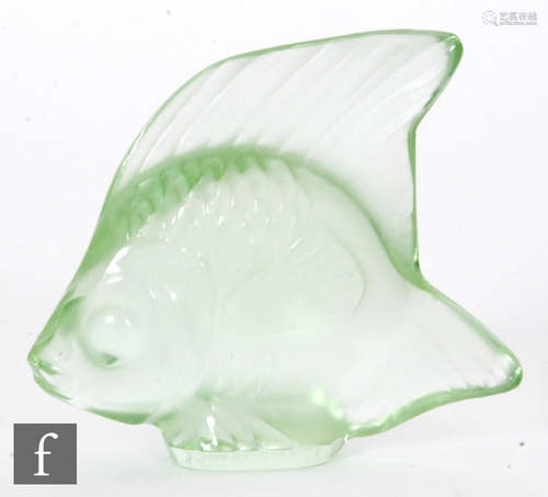 A Lalique glass fish sculpture in light green, engraved signature, height 4.5cm.