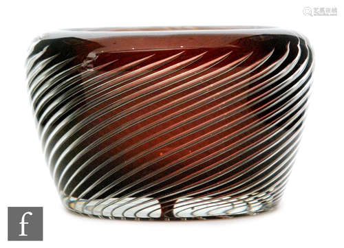 A small Kaj Frank for Nuutäjarvi ariel glass bowl of oval section, cased in clear crystal over ruby,