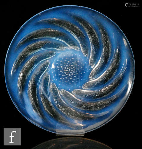 A Rene Lalique circular plate decorated in the Poissons pattern introduced in 1921 with spiralled