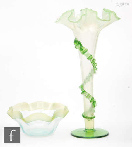 A late 19th Century Stourbridge glass posy vase of footed trumpet form with a frill rim and applied